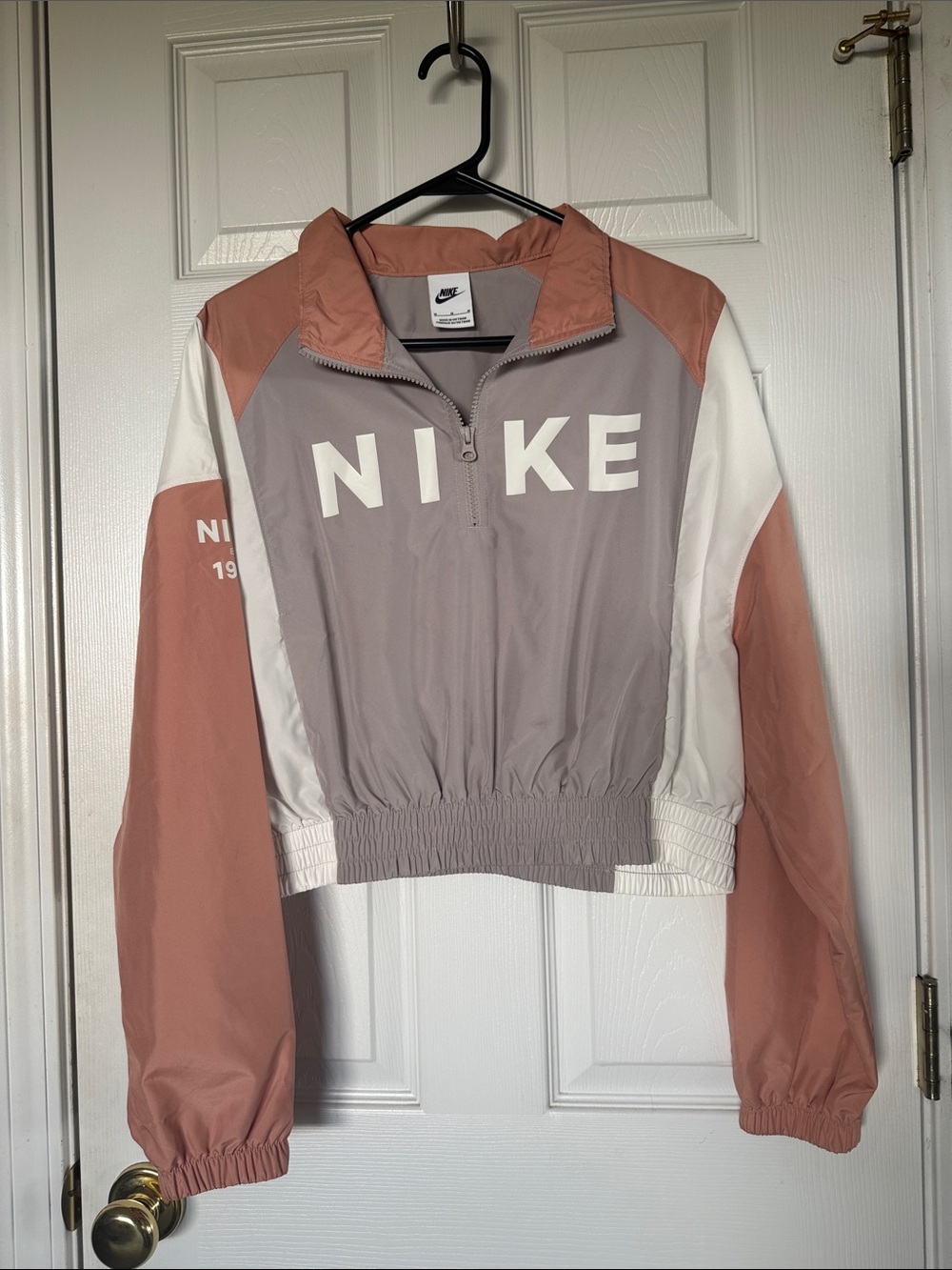 Nike Cropped Windbreaker Jacket in Dusty Rose, Gray & White
